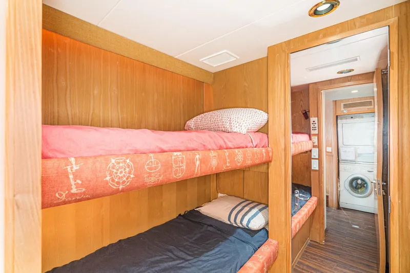 Slide: The Image of Bunk beds in the 1996 Hatteras 70 Sport Deck Motor Yacht cabin. - 19