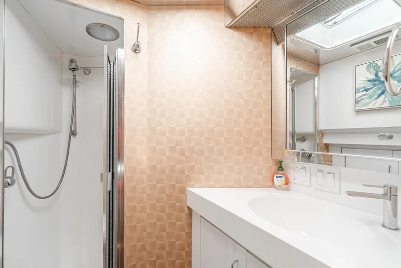 Slide: The Image of Bathroom interior of a 1996 Hatteras 70 Sport Deck Motor Yacht with shower and sink. - 20