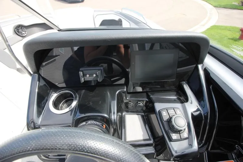 Slide: The Image of 2019 Yamaha Boats 212 Limited S dashboard with touchscreen display and controls. - 16