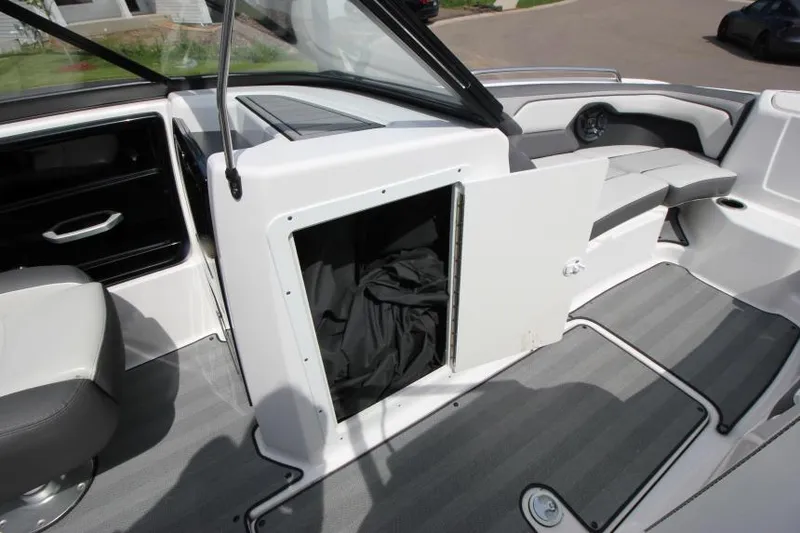 Slide: The Image of 2019 Yamaha Boats 212 Limited S interior storage compartment. - 27