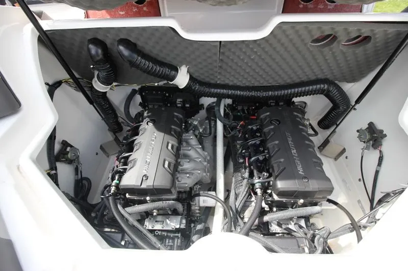 Slide: The Image of 2019 Yamaha Boats 212 Limited S engine compartment with twin engines. - 31