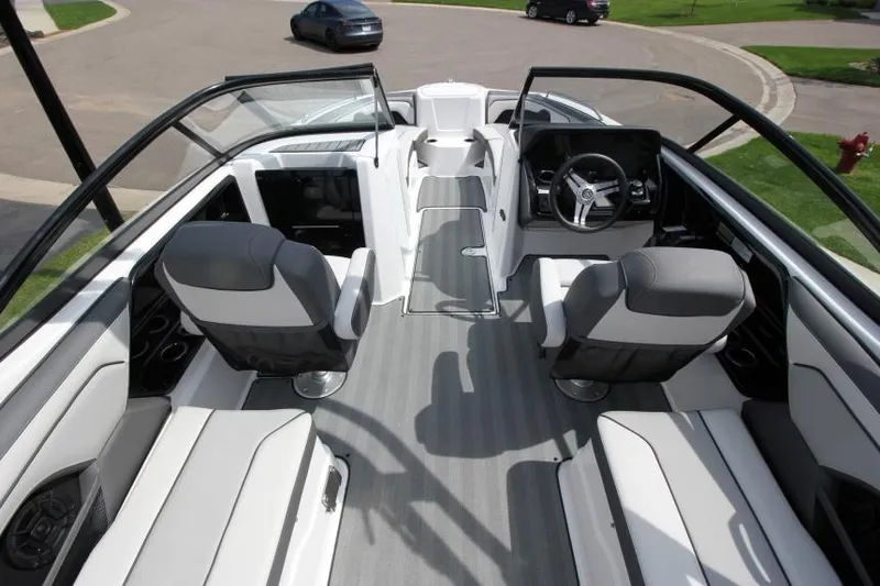 Slide: The Image of 2019 Yamaha Boats 212 Limited S interior with seating and steering wheel. - 32