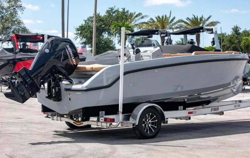 Slide: The Image of 2022 Rand BREEZE boat on trailer with Mercury outboard motor. - 15