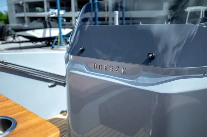 Slide: The Image of 2022 Rand BREEZE boat dashboard close-up in marina. - 5