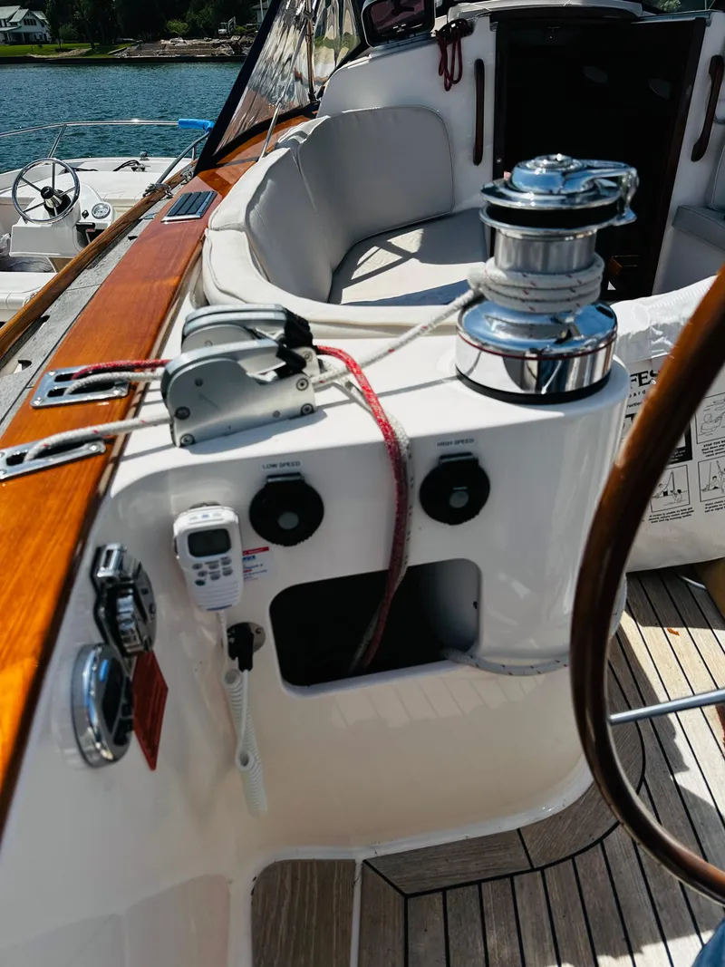 Slide: The Image of 2009 Alerion Express 38 sailboat cockpit with winch and control panel. - 17