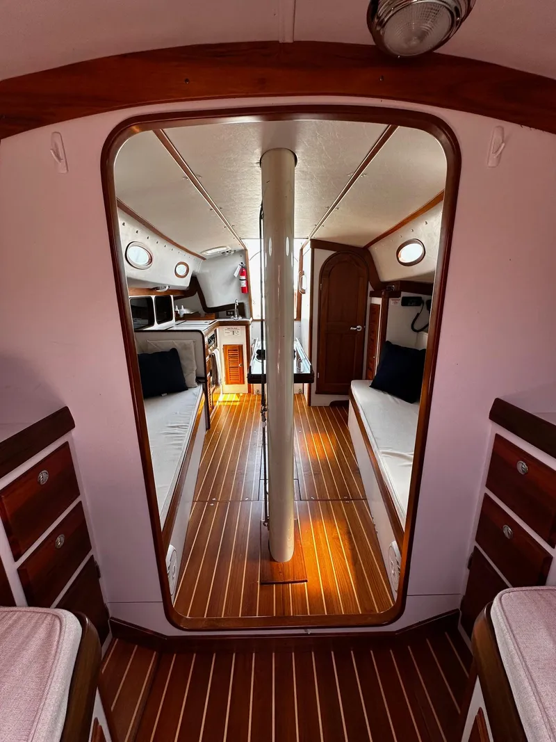 Slide: The Image of Interior of 2009 Alerion Express 38 sailboat with wood finish and cozy seating. - 30