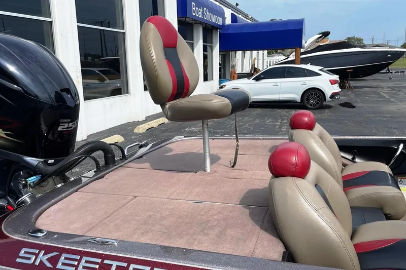 Slide: The Image of 2012 Skeeter FX20 boat with Yamaha 250 engine at dealership showroom. - 18