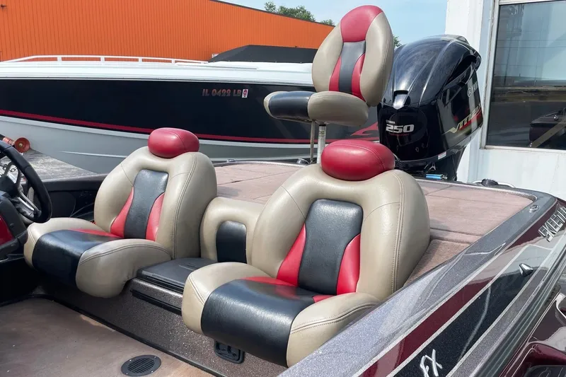 Slide: The Image of 2012 Skeeter FX20 boat interior with Yamaha 250 engine, featuring red and black seating. - 22