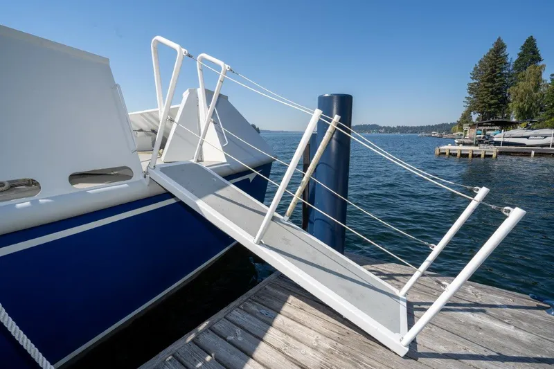 Slide: The Image of Catamaran with gangway docked on a sunny day, Dakota Creek model, 1999. - 15