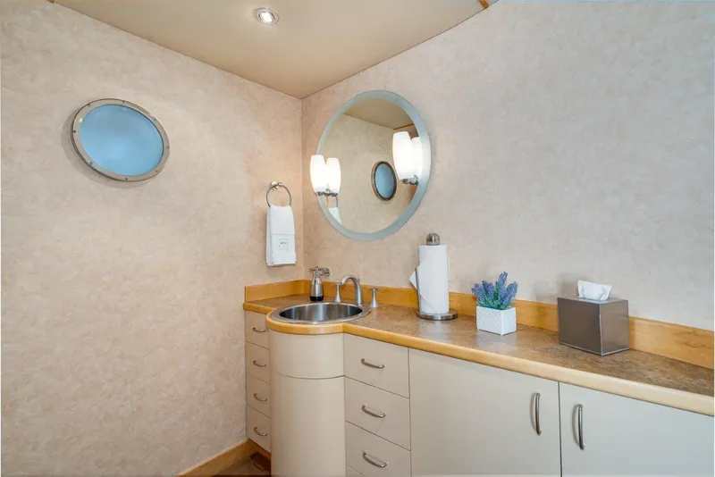 Slide: The Image of Luxurious bathroom on 1999 Dakota Creek Catamaran, featuring modern fixtures and elegant design. - 37