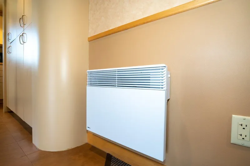 Slide: The Image of Wall-mounted heater in a Dakota Creek Catamaran, 1999 model, beige interior. - 39