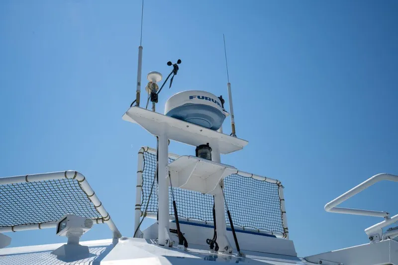 Slide: The Image of Radar equipment on 1999 Dakota Creek Catamaran Helicopter Capable under clear blue sky. - 43