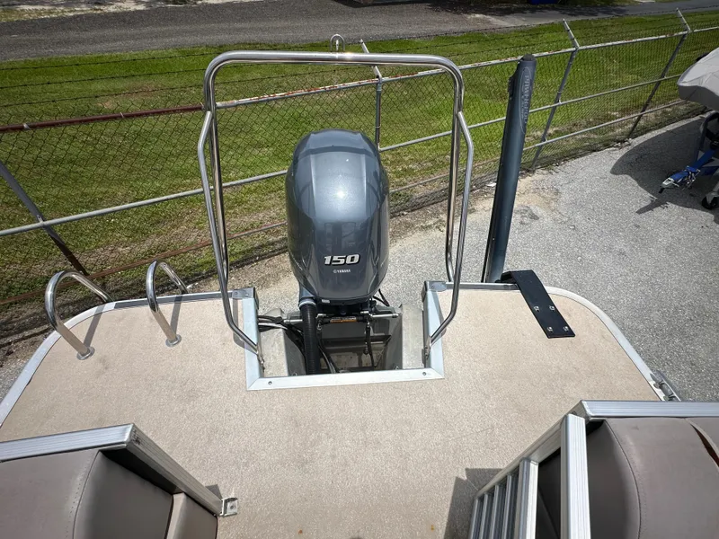 Slide: The Image of 2010 Bennington 2250RCW pontoon boat with a 150 HP Yamaha outboard motor. - 12