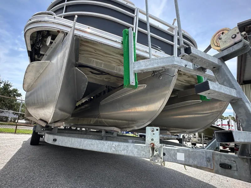 Slide: The Image of 2010 Bennington 2250RCW pontoon boat on a trailer, viewed from below. - 5