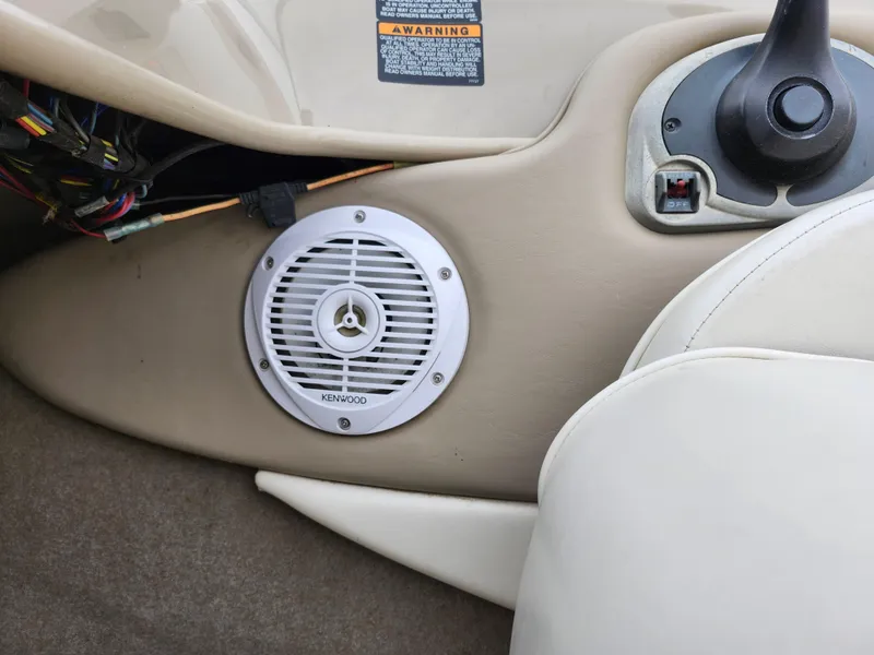 Slide: The Image of Kenwood speaker in 2002 Bayliner 215 Capri boat interior. - 14