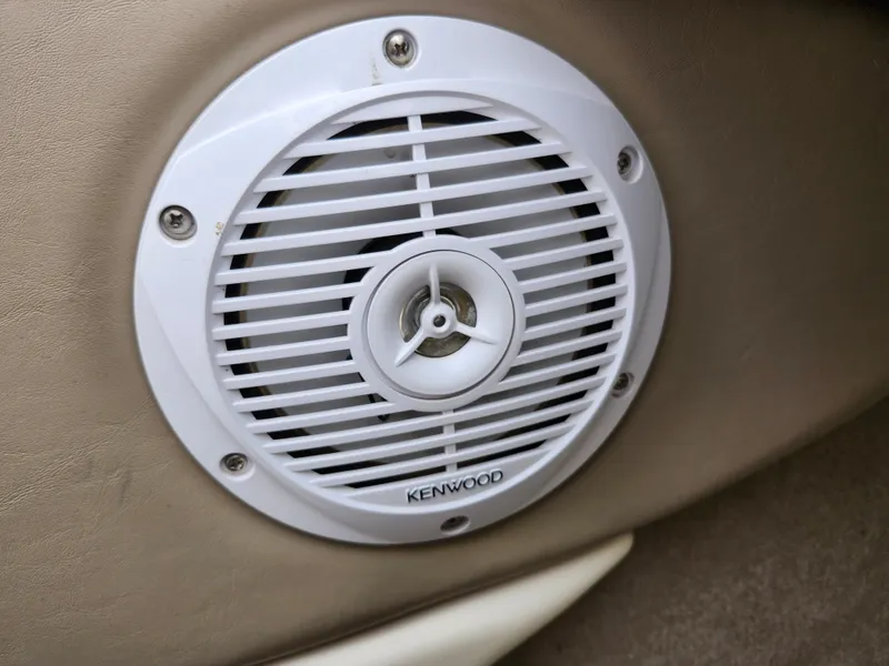 Slide: The Image of Kenwood speaker on 2002 Bayliner 215 Capri boat interior. - 15
