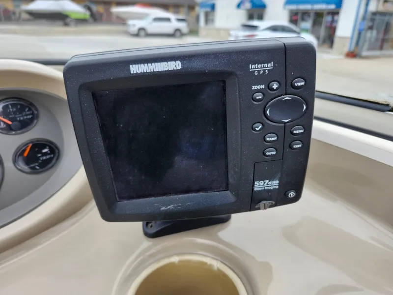 Slide: The Image of Humminbird fish finder on 2002 Bayliner 215 Capri boat dashboard. - 18