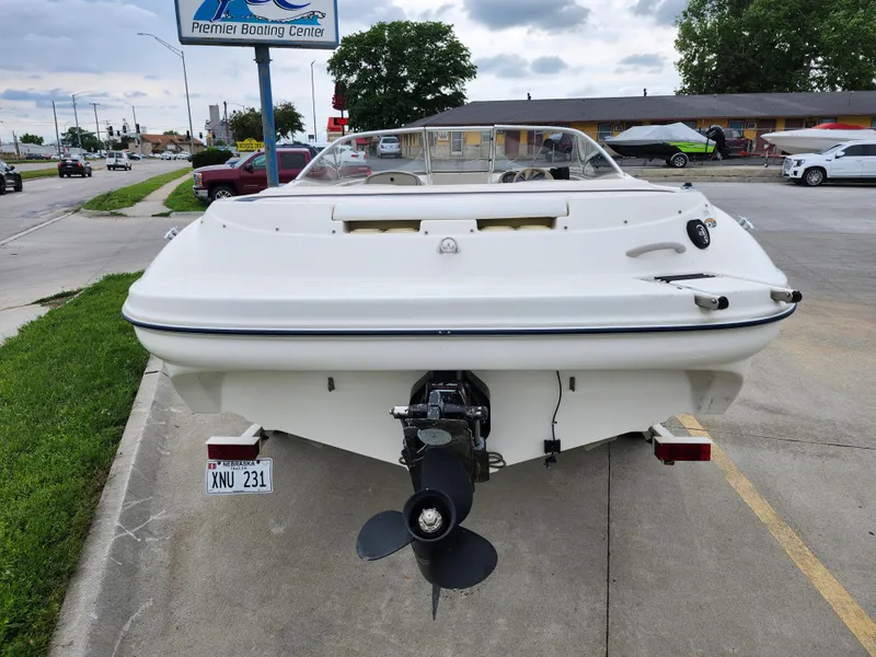 Slide: The Image of 2002 Bayliner 215 Capri boat rear view at Premier Boating Center. - 3