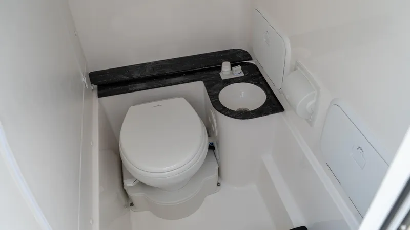 Slide: The Image of 2025 Fountain 38 TE boat bathroom with toilet and sink - 20