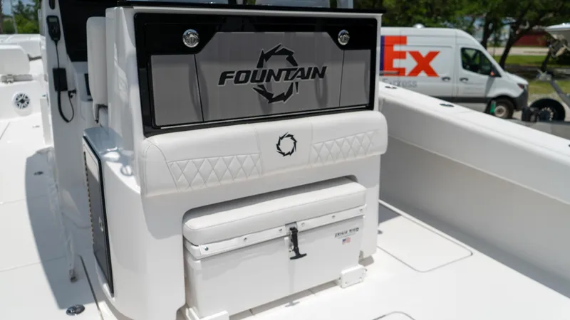 Slide: The Image of Fountain 38 TE 2025 model boat interior with branded seating and storage. - 22