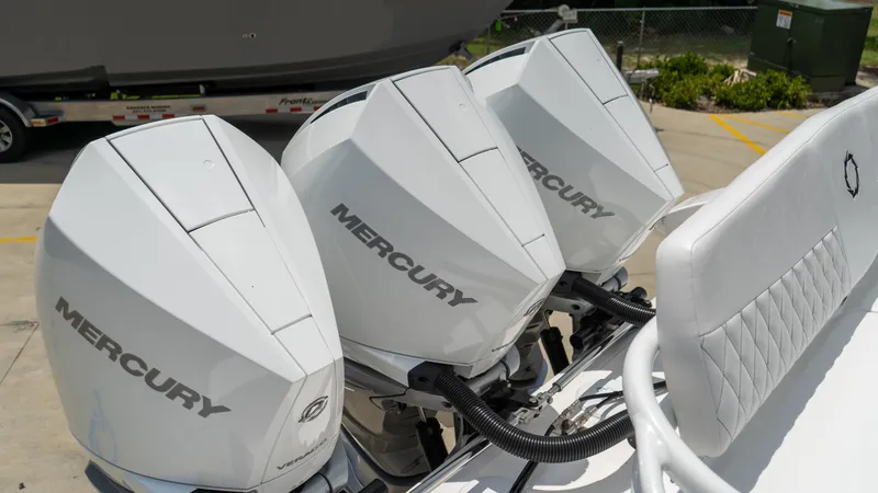 Slide: The Image of 2025 Fountain 38 TE boat with triple Mercury outboard engines. - 29