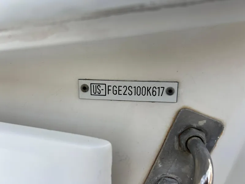 Slide: The Image of Hull Identification Number (HIN) plate on a 2017 Cobalt 220S boat. - 25