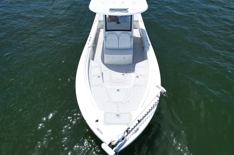 Slide: The Image of 2020 Regulator 26XO boat on water, aerial view. - 10