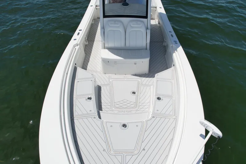Slide: The Image of 2020 Regulator 26XO boat deck on water. - 11