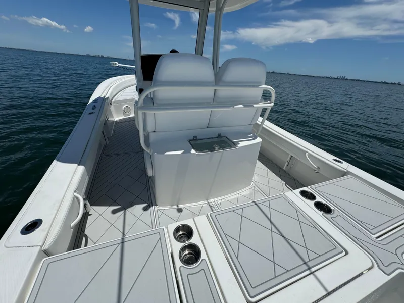 Slide: The Image of 2020 Regulator 26XO boat interior on open water. - 23