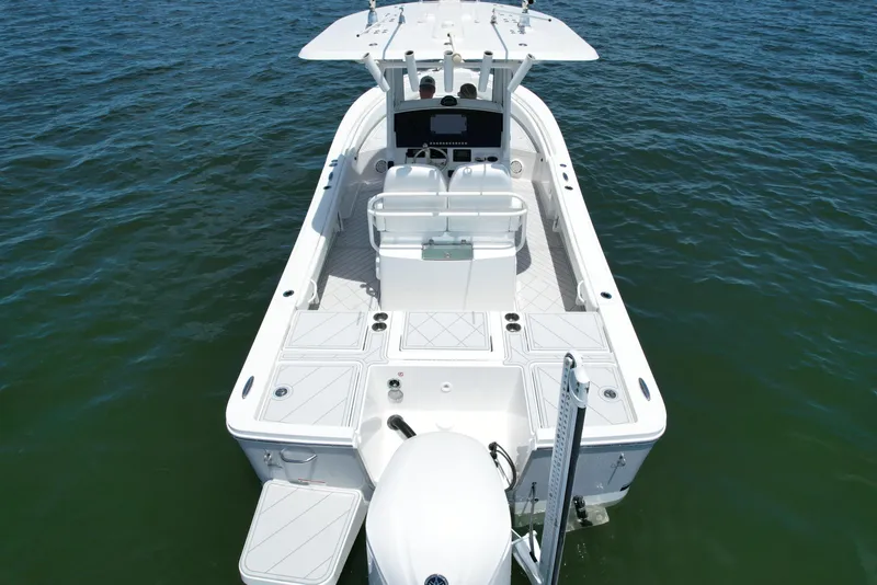 Slide: The Image of 2020 Regulator 26XO boat on water, aerial view. - 8