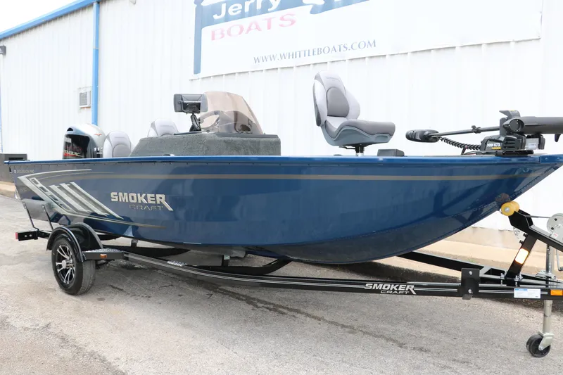 Slide: The Image of 2024 Smoker Craft Excursion Pro 176 SC Pro boat on trailer outside dealership. - 10