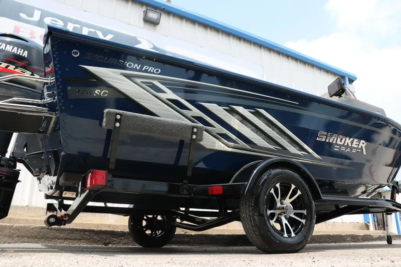 Slide: The Image of 2024 Smoker Craft Excursion Pro 176 SC Pro boat on trailer, side view. - 2