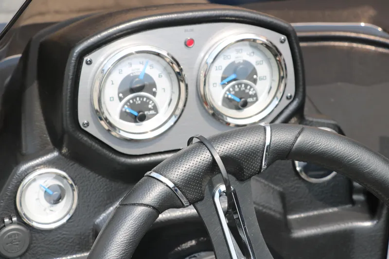 Slide: The Image of 2024 Smoker Craft Excursion Pro 176 SC Pro dashboard and steering wheel. - 28