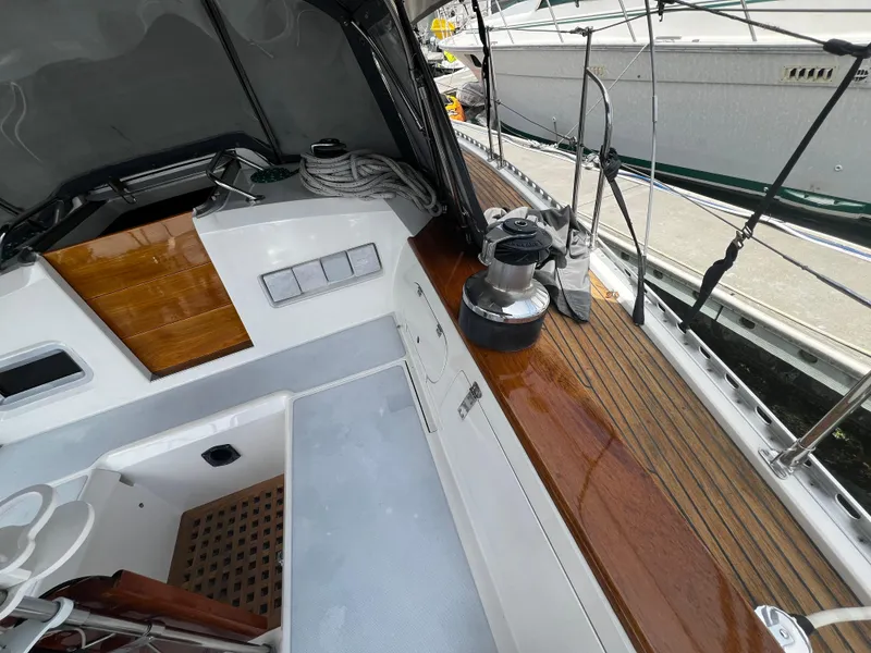 Slide: The Image of 1987 Norseman 400 sailboat deck with winch and teak accents. - 15