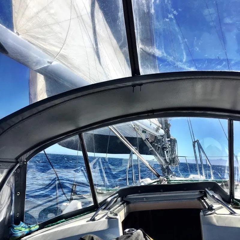 Slide: The Image of Sailing on a 1987 Norseman 400 yacht with clear blue skies and ocean. - 6