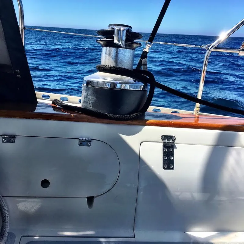 Slide: The Image of Sailboat deck view with winch, Norseman 400, 1987, ocean in background. - 8