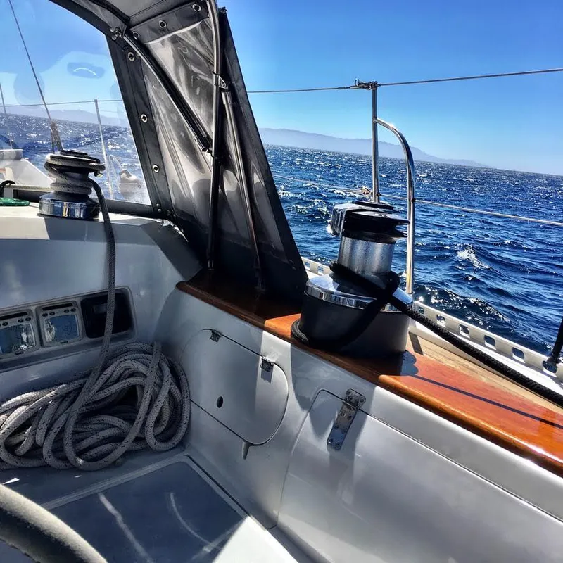 Slide: The Image of Cockpit view of 1987 Norseman 400 sailboat on open sea under clear blue sky. - 9
