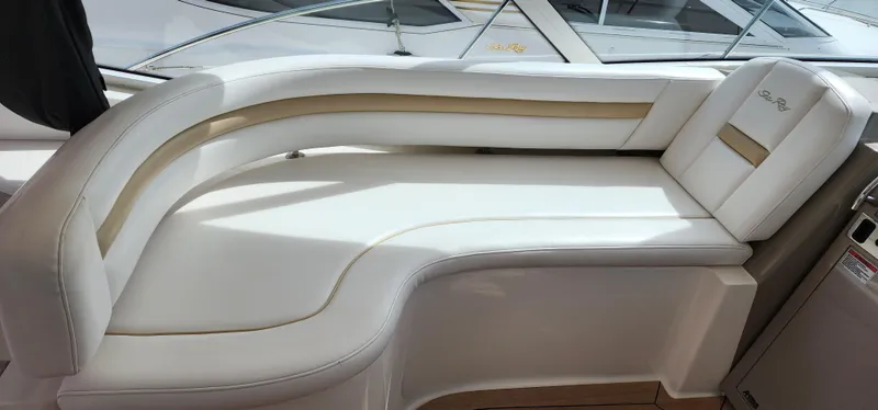 Slide: The Image of Luxurious seating on 2009 Sea Ray 500 Sundancer yacht, featuring elegant white upholstery. - 11