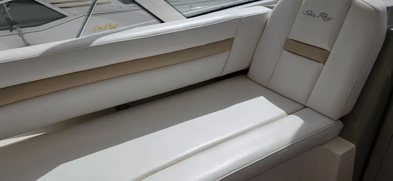 Slide: The Image of 2009 Sea Ray 500 Sundancer interior with white leather seating. - 18