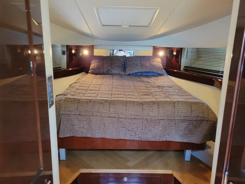 Slide: The Image of Luxurious bedroom interior of 2009 Sea Ray 500 Sundancer yacht. - 32