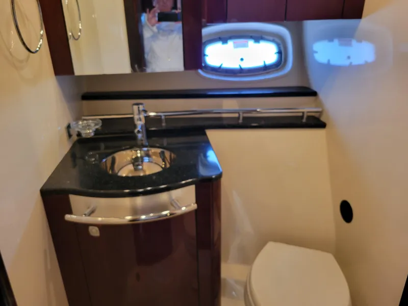 Slide: The Image of Luxurious bathroom in 2009 Sea Ray 500 Sundancer yacht with sink and toilet. - 33