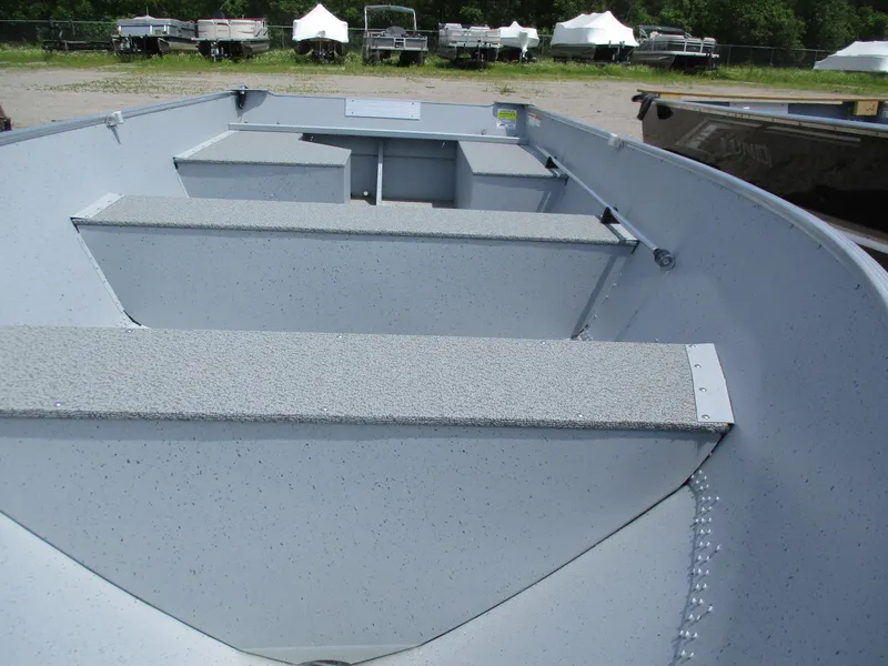 Slide: The Image of 2024 Lund WC 14 Tiller boat interior with bench seats. - 3