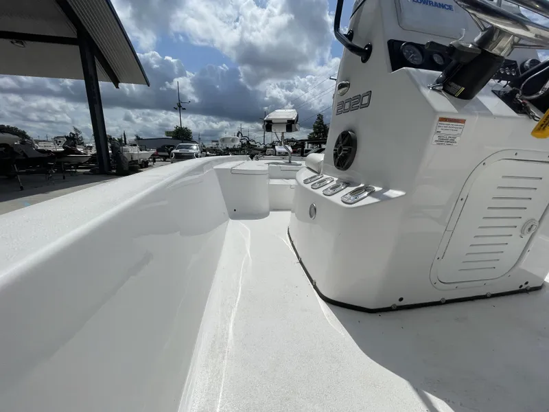 Slide: The Image of 2021 Blazer 2020 model boat interior with control panel and seating area. - 17