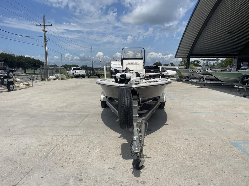 Slide: The Image of Blazer Bay 2020 boat on trailer in outdoor lot, sunny day, 2021 model. - 8