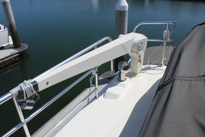 Slide: The Image of Deck of Cherubini Independence 50 yacht, 1999 model, featuring davit. - 14