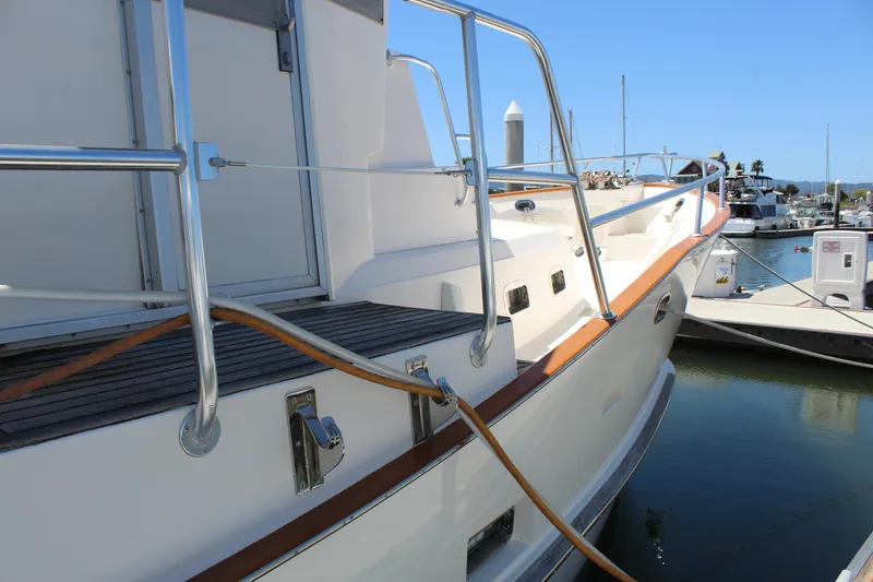 Slide: The Image of 1999 Cherubini Independence 50 yacht docked at marina. - 23