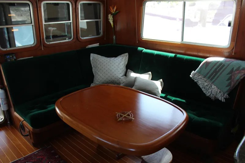 Slide: The Image of Interior of 1999 Cherubini Independence 50 yacht with cozy seating area. - 42