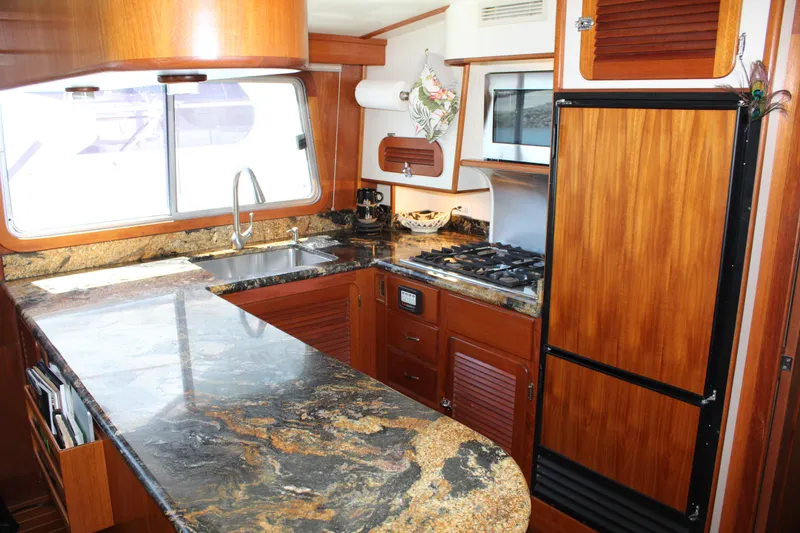 Slide: The Image of Kitchen area of Cherubini Independence 50 yacht, year 1999. - 43
