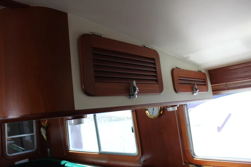 Slide: The Image of 1999 Cherubini Independence 50 interior with wooden cabinets. - 47