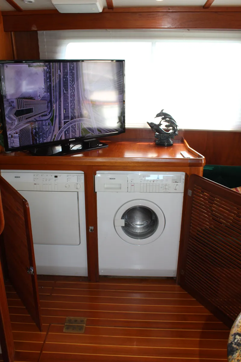Slide: The Image of Interior of Cherubini Independence 50 with washer and TV, built in 1999. - 49